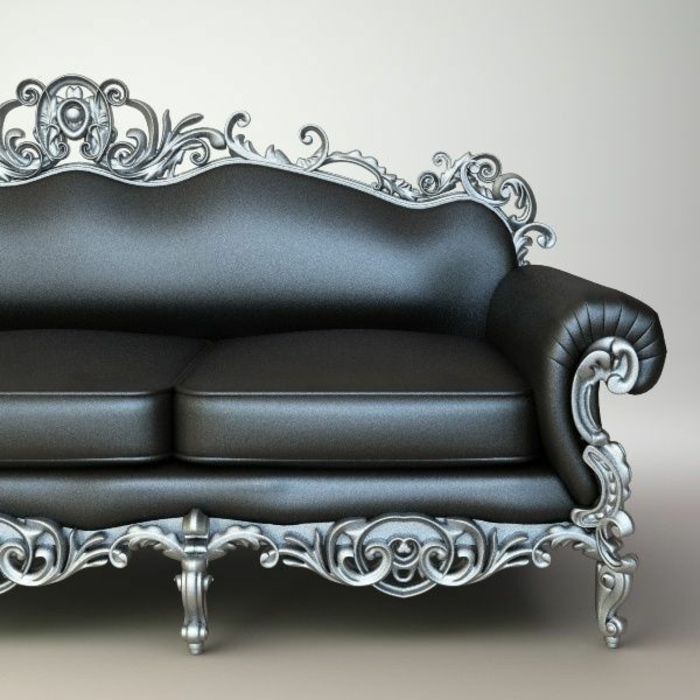 elegante Ledercouch in Grafitfarbe mit zwei Sitzkissen, Metallbeine in Grauer Farbe mit vielen gotischen Ornamenten 