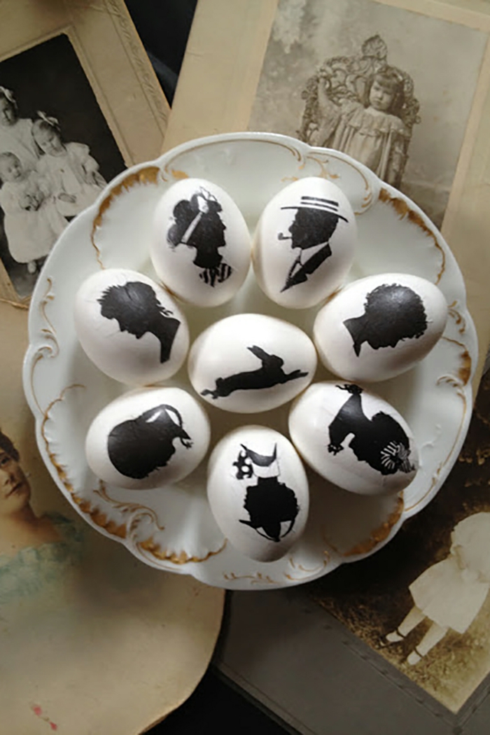 vintage Look von Eier in schwarzer Farbe auf weißen Hintergrund verschiedene Figuren