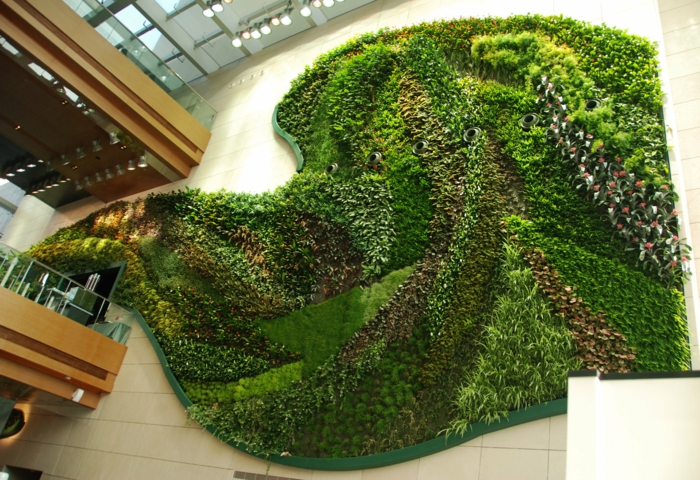 eine Kunst Installation aus Pflanzenarten wie vertikal Garten - Moos auch