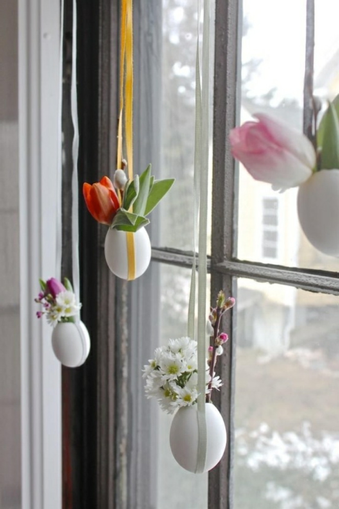 Vasen basteln für die Fensterdeko Ostern aus frischen Blüten