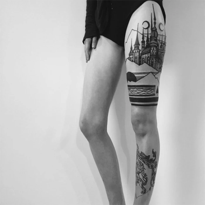 tattoo am oberschenkel, turm, weibliche tattoo motive