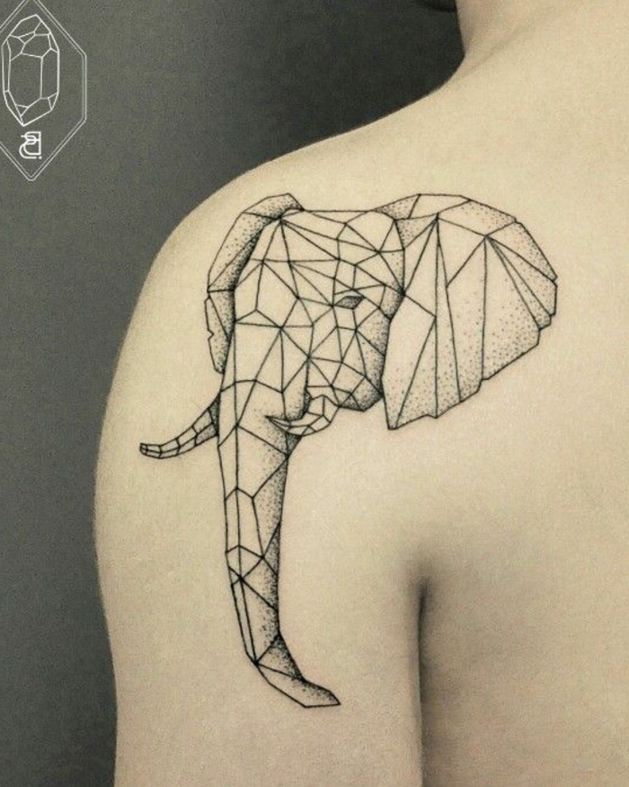 hier zeigen wir ihnen eine idee zum thema origami tattoo - ein tattoo mit einem origami elefant auf dem schulterblatt 