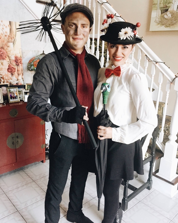Merry Poppins und Stornsteinsteiger mit dem Regenschirm von Papagei Kopf