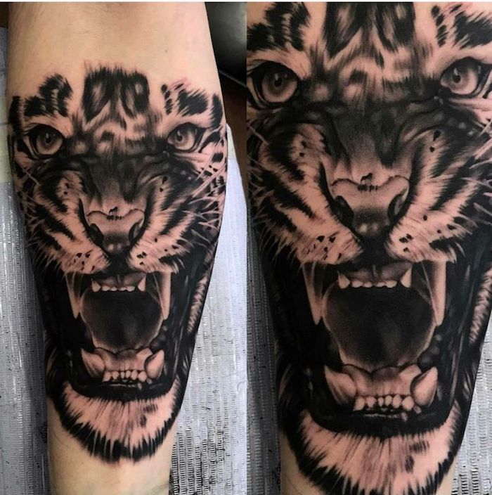 tigerkopf tattoo, arm, armtattoo, tätowierung in schwarz und weiß