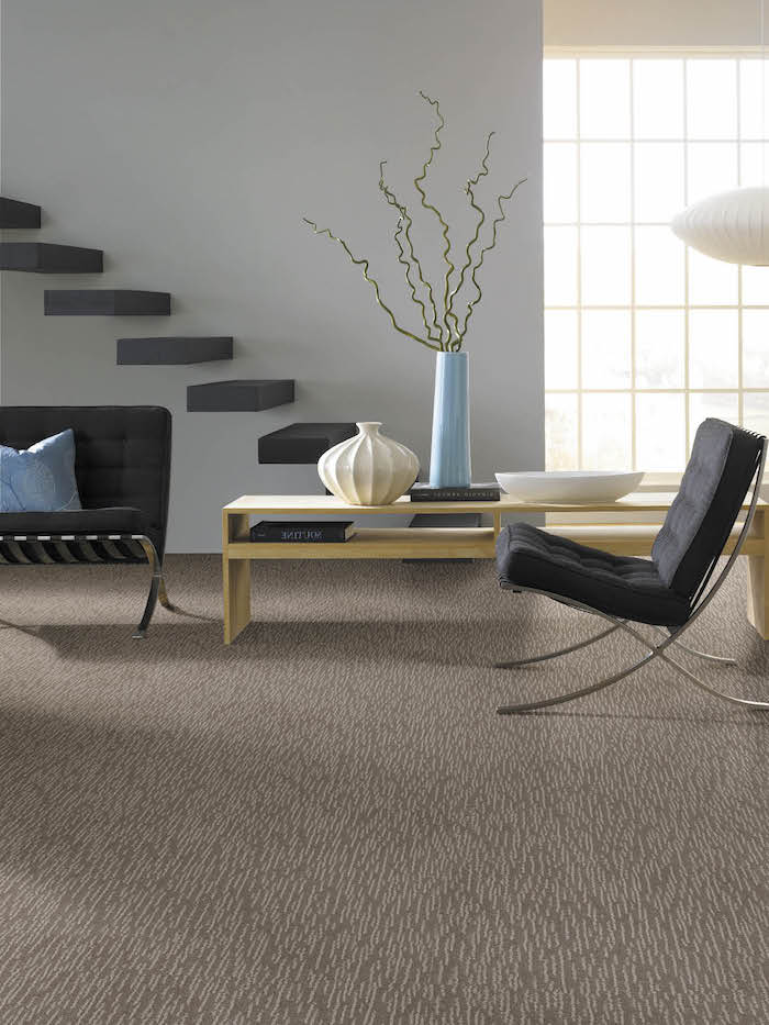 modernes Wohnzimmer mit Designer Möbel und Designer Fußboden aus Marmor in brauner Farbe