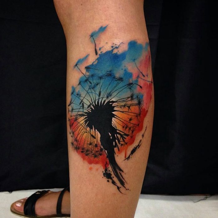großes farbiges pusteblume tattoo am bein, wasserfarben tattoo
