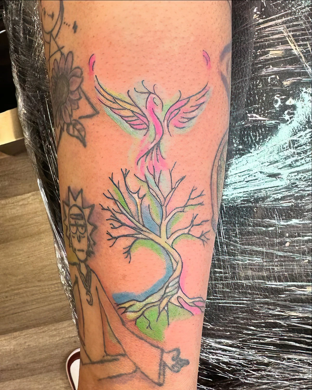 raincitytattooss profilbild baum des lebens tattoo mit phoenix