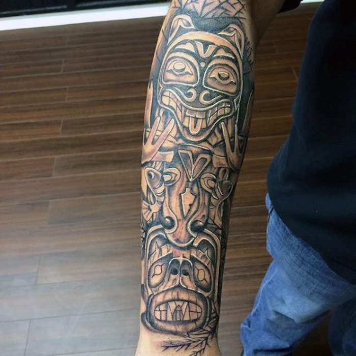 tattoo motive männer, tätowierung mit indianischen motiven am arm