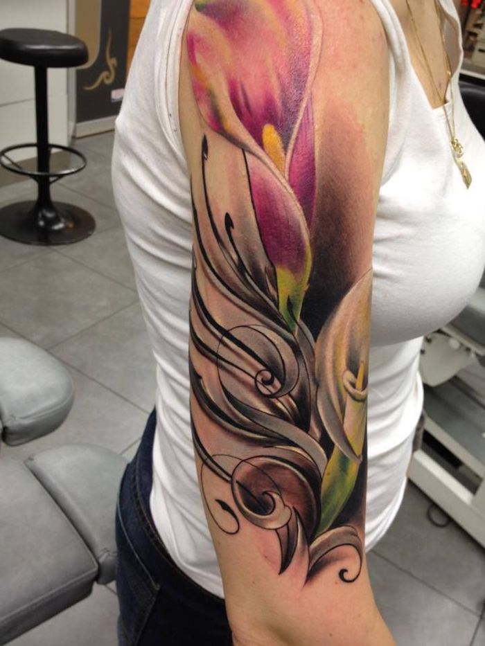 Blumen oberarm tattoo schmetterling Marsha Ambrosius