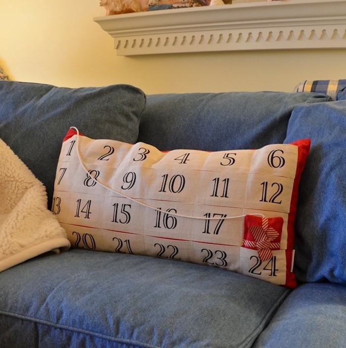Adventskalender basteln für Männer - ein Kissen mit Nummer, in den Taschen kann man Geschenke verstecken
