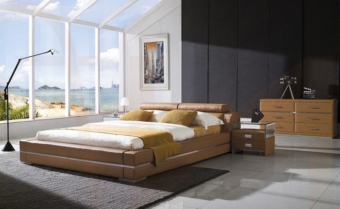 ein Haus mit Panorama, Doppelbett mit braunem Bettwäsche, ein grauer Teppich - schöne Zimmer