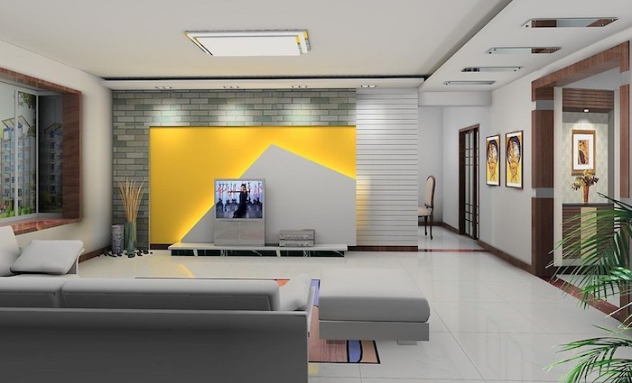 tv paneel grau gelbes design an der wand wanddeko ideen wandbilder graues sofa hocker wandfarben, wohnzimmer ideen tv wand