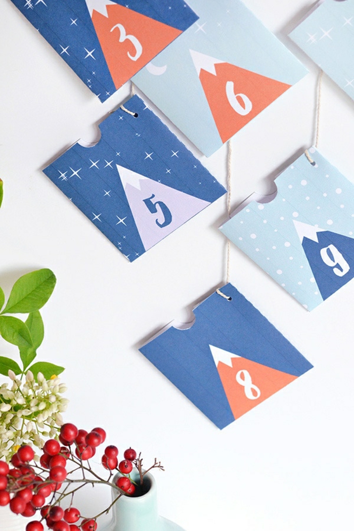 Adventskalender aus bunten Papiertüten selber machen, mit kleinen Geschenken befüllen