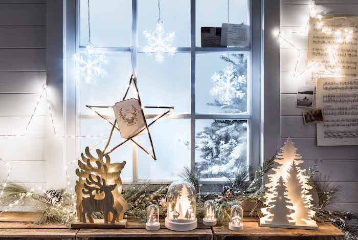 fensterdeko basteln stern deko leuchtende dekorationen renntier tannenbaum weihnachtsbaum kerzen deko ideen