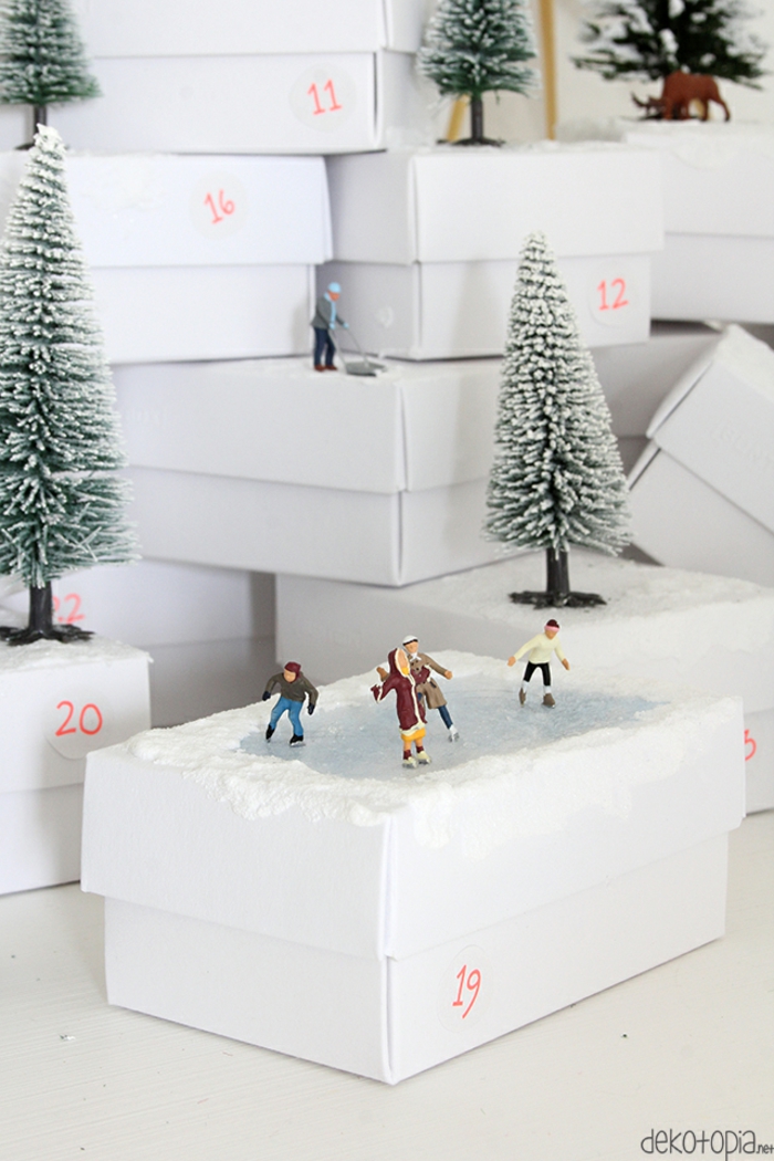Coole Alternative zum klassischen Adventskalender, weiße Schachteln selbst verzieren und mit Geschenken füllen