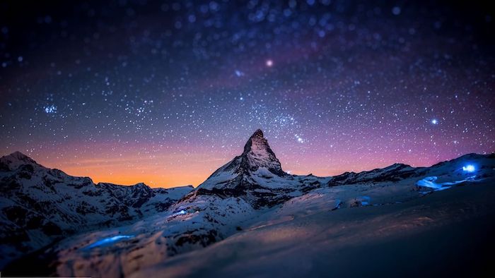 schöne winterbilder - ein blauer himmel mit vielen weißen sternen - winterberge mit schnee