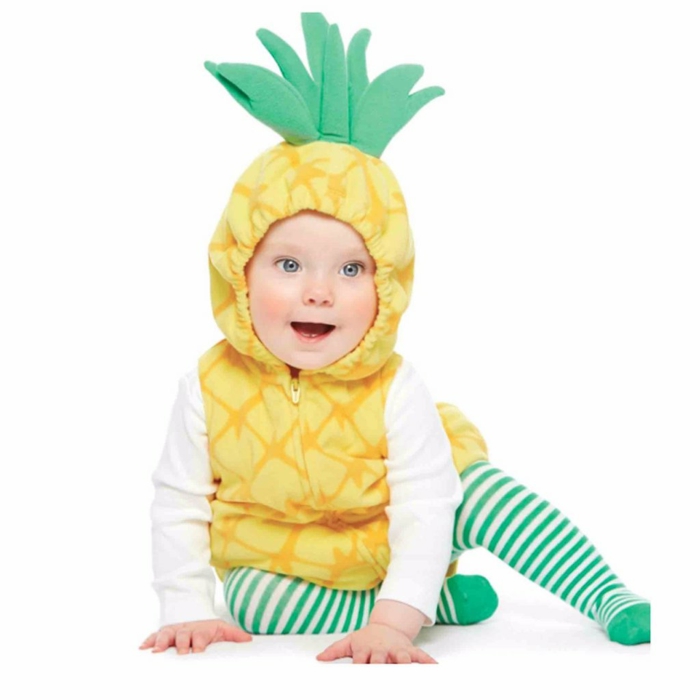 Ananas Kostüm von einem kleinen Baby, grüne Strumpfhose, gelbe Jacke