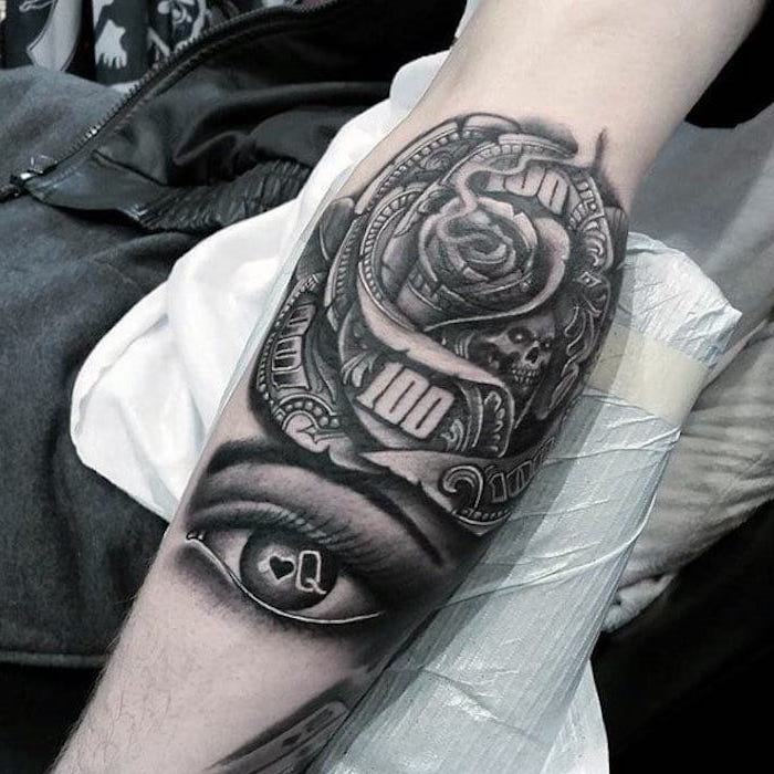 tattoo muster, große rose in kombination mit frauenauge, arm 
