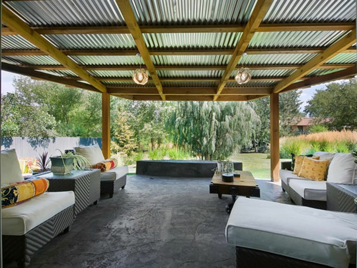 moderne Terrasse mit symmetrischer Gestaltung und Beton Bodenbelag