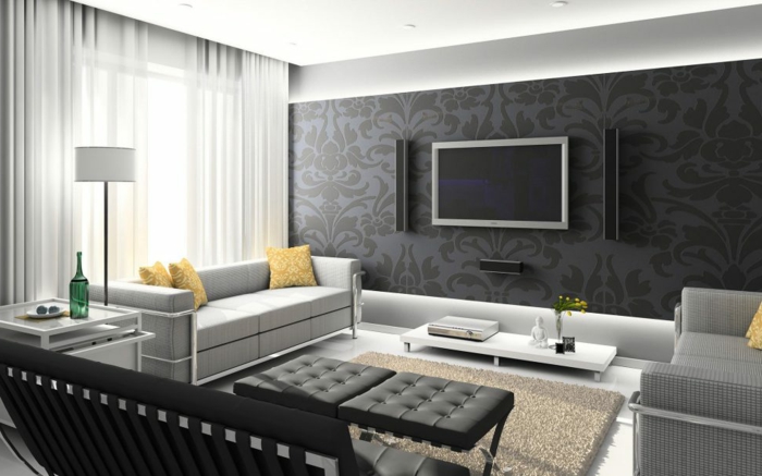 grau gestrichene Wohnwand selber zusammenstellen, zwei graue Sessel, zwei Hocker, ein brauner Teppich