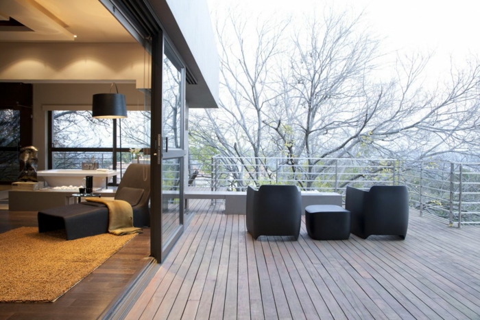 mit einer passenden Überdachung kann man auch im Winter die Terrasse benutzen - Terrassen Gestaltungsmöglichkeiten