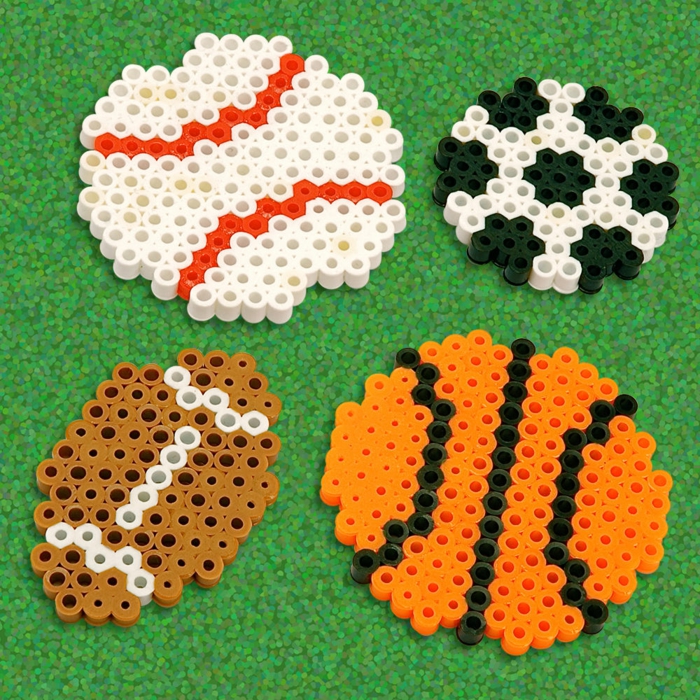 Bügelperlen Ideen - vier Figuren von Bällen, ganz realistisch für Sportfans