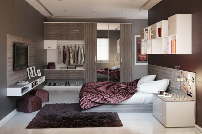 eine Garderobe in der Ecke, Bett mit lila Decke, ein niedriges Regal, schwarzer Teppich, moderne Zimmer