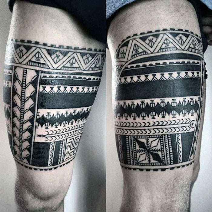frisches tattoo, mann mit großer tätowierung mit polynesichen motiven, geometrische elemente, bein tätowieren