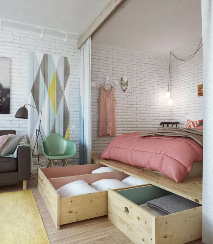 weiße Wände mit Backstein Optik Wänden, Einzimmerwohnung einrichten, hoch gestelltes Bett
