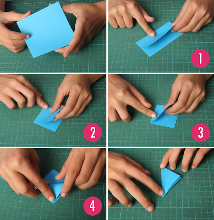 eine pop up karten anleitung in vier schritten, eine gefaltete kleine blaue pop up karte und zwei hände 