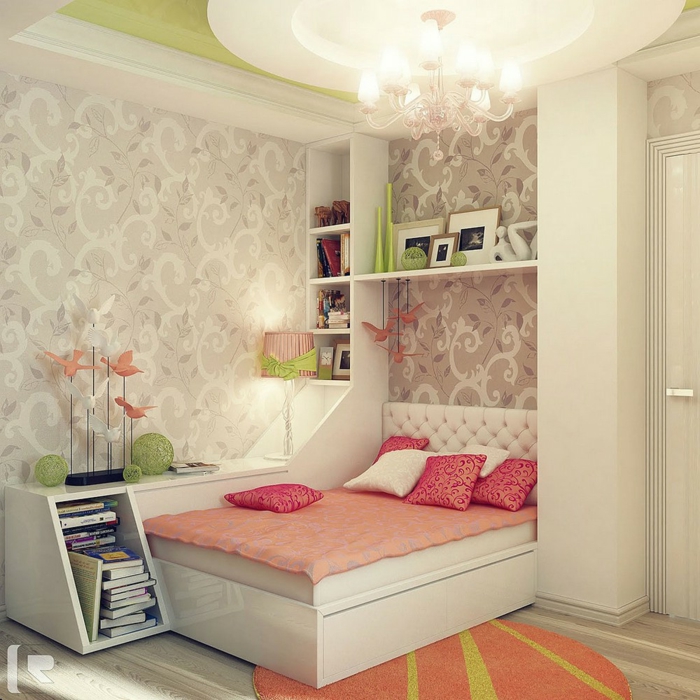 ein kleines rosa Bett in der Ecke, eine Einzimmerwohnung einrichten, kleine Räume optisch größer wirken lassen