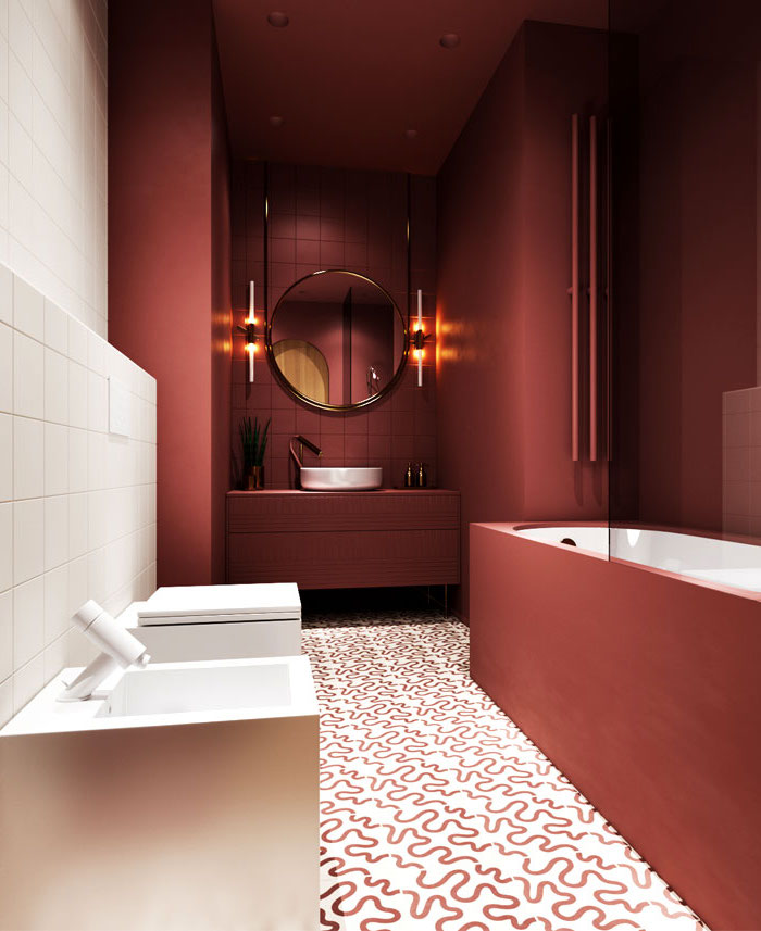 Badezimmer Einrichtung, rote Wandfliesen und Badewanne, weißes Waschbecken, runder Spiegel