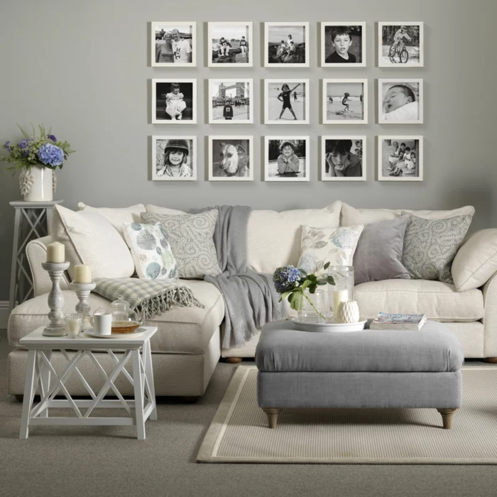 ein Fotowand, moderne Wandfarben, weiße Kissen und graue Decken
