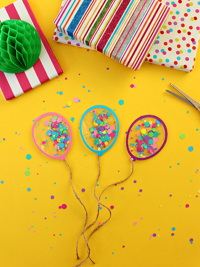 Kleine Ballons aus Papier und Folie mit Konfetti füllen, lustige DIY Idee für Kinder und Erwachsene
