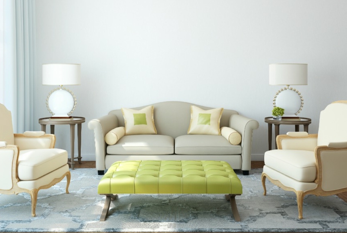 eine symmetrische Gestaltung, zwei Sessel und ein Sofa, grüner Tisch, Einrichtungsideen Wohnzimmer