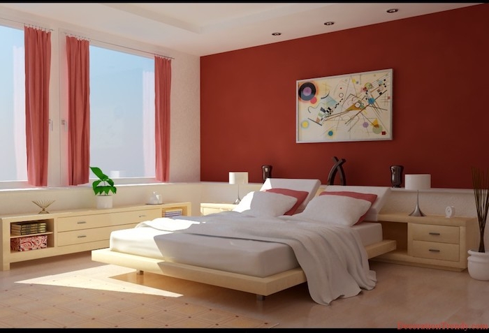 wandfarbe schlafzimmer, ein bett mit einer weißen decke und mit roten und weißen kissen und eine große rote wand, schlafzimmer streichen ideen