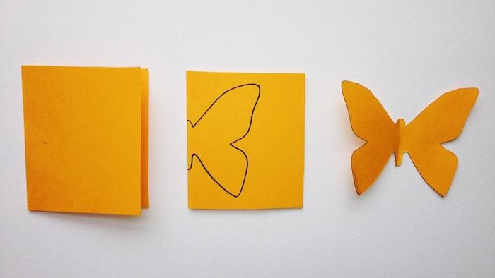 3D Schmetterlinge selber machen, Papierbogen in der Mitte falten, Schmetterling zeichnen und ausschneiden