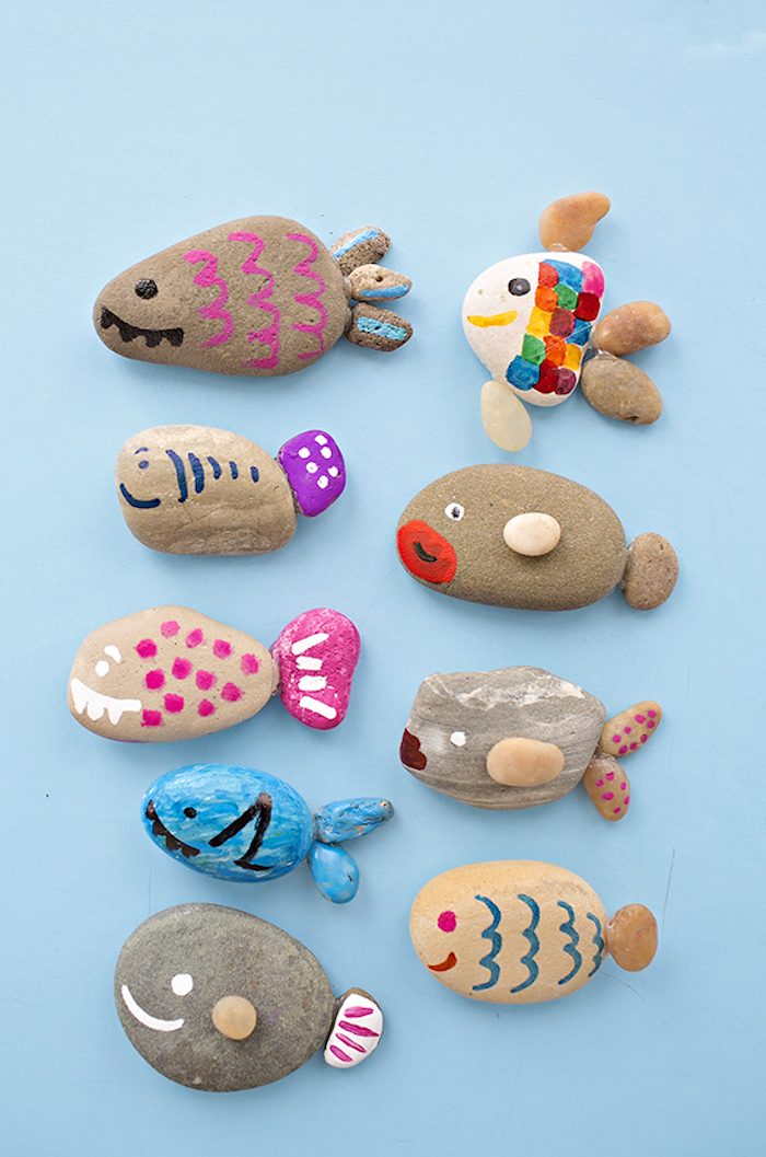 DIY Idee für Kinder, Steine mit Filzstiften bemalen, bunte Fische gestalten