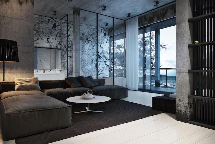 wohnzimmer weiß grau, großes schwarzes sofa, weißer boden, wand mit marmor muster