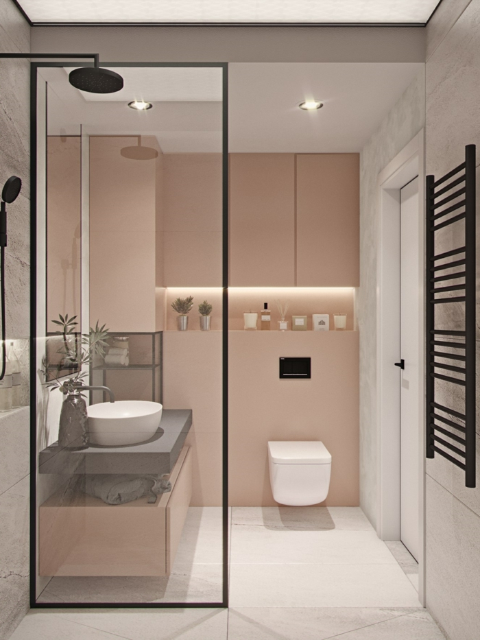 ein kleines Badezimmer mit Deckenleuchten, weißem Fliesenboden, ein rundes Waschbecken, Badideen