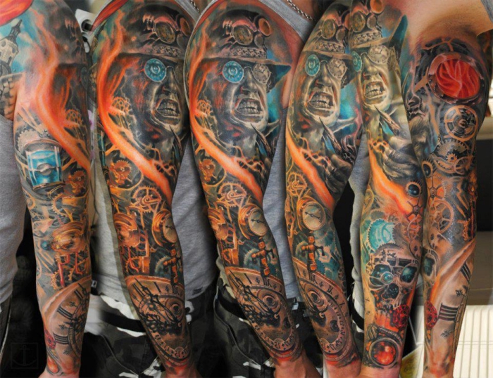 amazing tattoos, farbiges sleeve tattoo, mann mit hut und brillen, steampunk