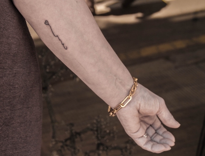 Ring bedeutung mann unterarm Armband Tattoo