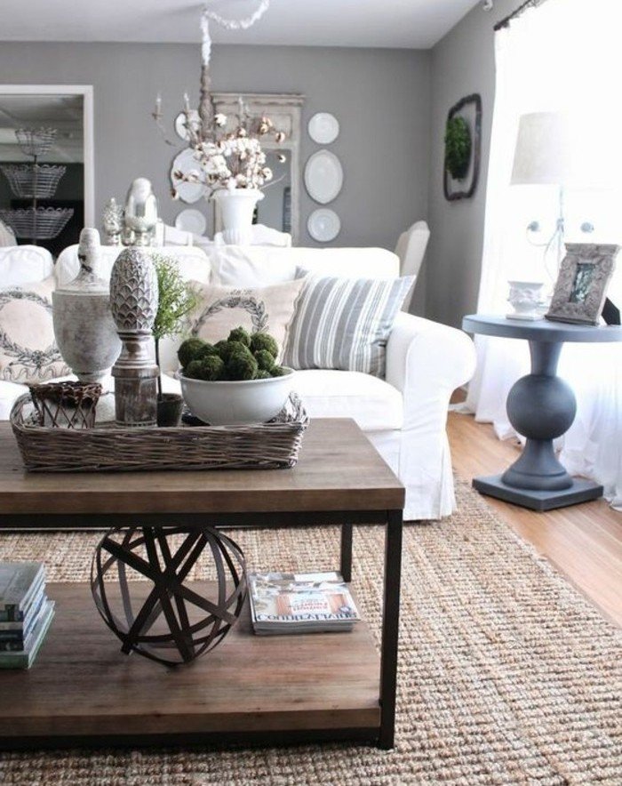 ein Tisch aus Holz, weißes Sofa, ein runder grauer Tisch, Sofa in weißer Farbe, Wohnzimmer Ideen Weiß Grau
