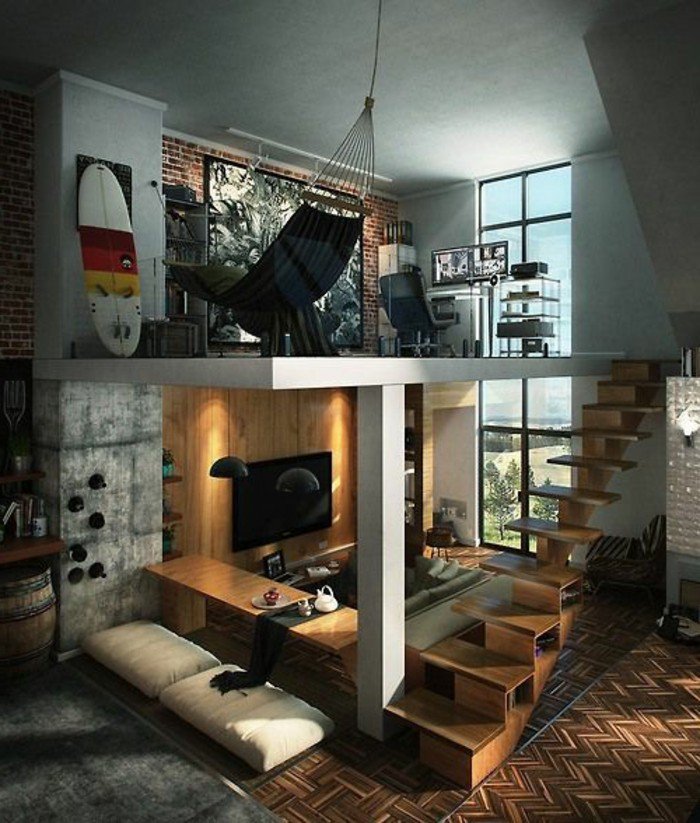 Wohnzimmer gestalten, eine Treppe, ein Hängematte, graues Sofa und eine Fernsehwand