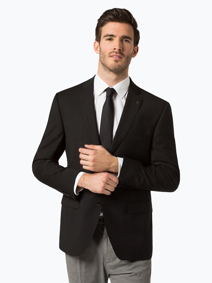 Den perfekten Anzug finden, schwarzes Sakko, weißes Hemd, schwarze Krawatte, graue Hose