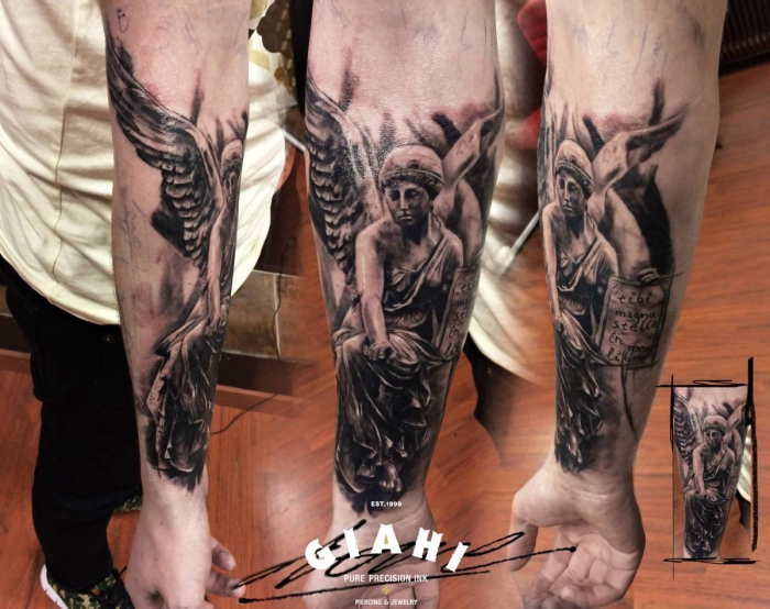 Engel mann unterarm tattoo Tattoo Arm