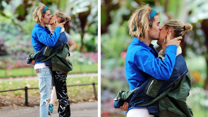 Justin und Hailey küssen sich im Park, sie sehen ganz schön aus