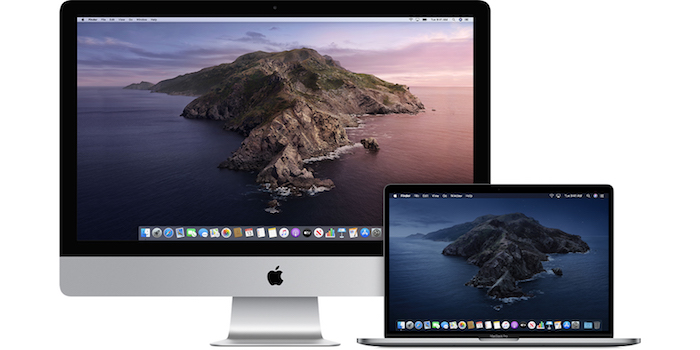 ein pc und ein macbook pro, zwei äpple geräte mit dem betriebssystem macos catalina von apple, ein bildschirm mit ibild mit insel