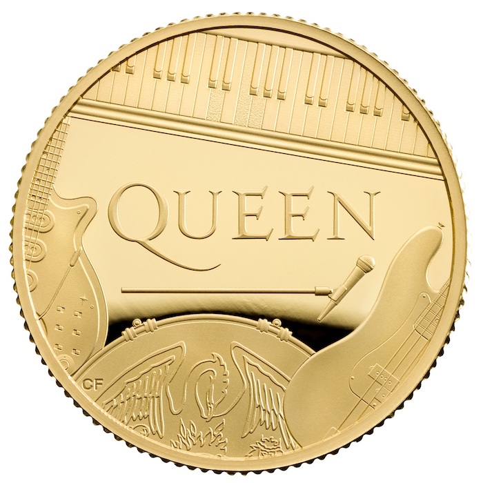 eine münze mit einer goldenen gitarre und mit dem logo von der britischen rock band queen, eine goldene münze 