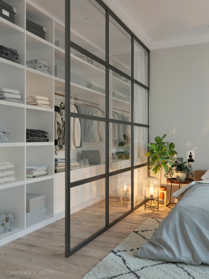 ikea offener Kleiderschrank getrennt vom Schlafzimmer durch eine Glastür, schwarz weißer Teppich